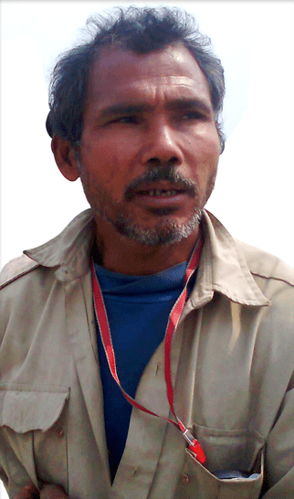 Distractedly Jadav ‘Molai’ Payeng poses for a photo wondering if his cousin has managed to jailbreak his new iPhone (Photo: Wikipedia)