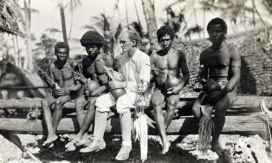 Polish anthropologist Bronislaw Malinowski with Trobriand Islanders of Melanesia, 1918 (Photo: Wikimedia Commons/London School of Economics Library Collections).