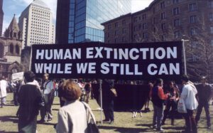 "Human extinction while we still can" sign at protest. (Photo: The Church of Euthanasia website)