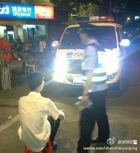 Shenzen Police punishing a driver in 2014