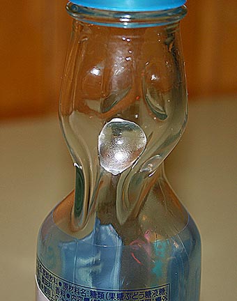 The Codd-neck marble lock in the neck of a Ramune bottle. (Photo: Wikimedia)