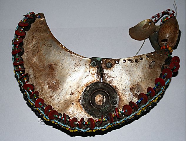 Kula arm bracelet. The names of the people who have owned the bracelet are written all over it. This Kula item is from Nabwageta Island, Papua New Guinea. (Wikimedia/Brocken Inaglory)