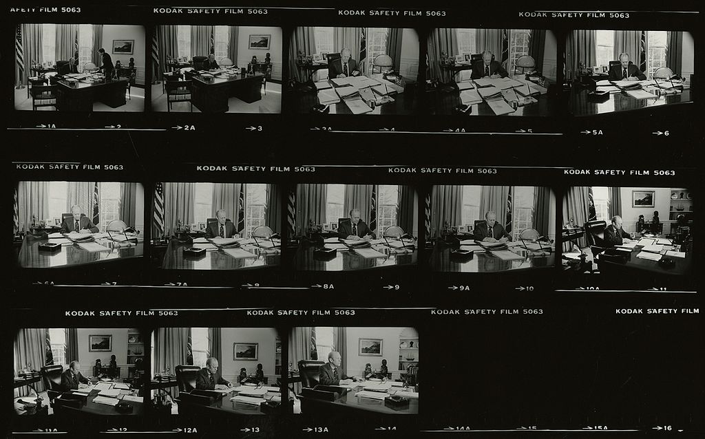 Contact sheet of President Gerald Ford signing Executive Order