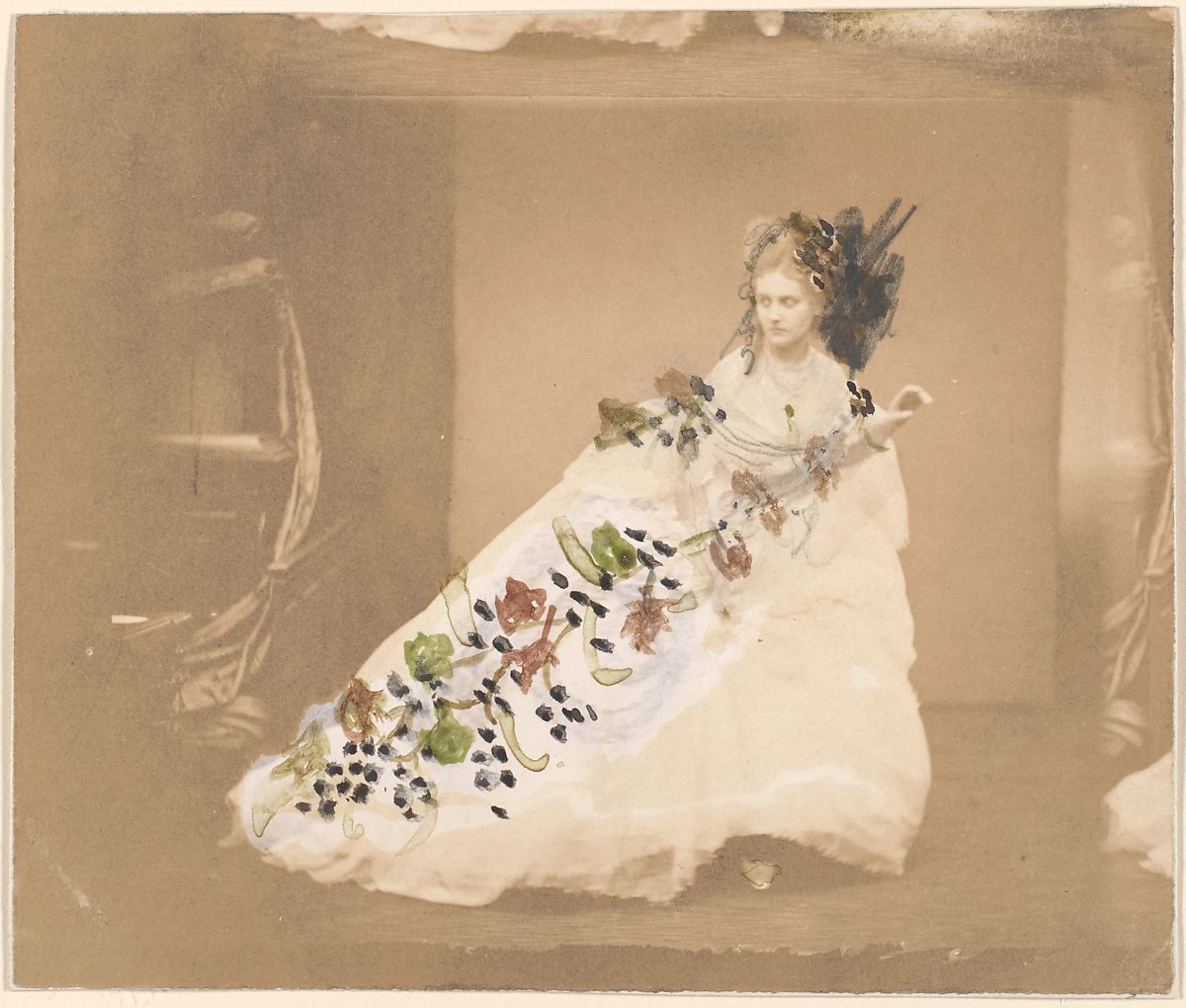 This photograph was retouched by the countess with instructions (on the back) suggesting that the composition was intended to set off her elegant attitude and majestic gown: "The remains of a ball where fire has broken out. A chandelier on the floor, everyone in flight. Shining white satin gown, black and red grapes with dark green and red leaves. (Photo: Met Museum)