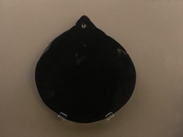 Polished obsidian turned into a smoking mirror, associated with Tezcatlipoca. (Photo: Wikimedia/Alvaro Martinez)