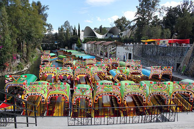 Trajinera boats take tourists on tours through the floating gardens Xochimilco, near Mexico City. (Photo: Wikimedia/Anagoria)