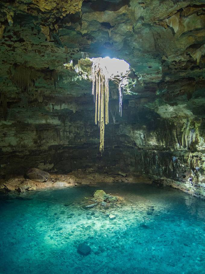 Cenote Samula in Valladolid, Yucatán, Mexico. In Mesoamerican mythology, cenotes are considered gateways to the underworld. (Photo: Wikimedia/Flickr/dronepicr)