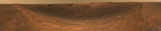 This approximate true-color image taken by the panoramic camera on the Mars Exploration Rover Opportunity shows the impact crater known as 