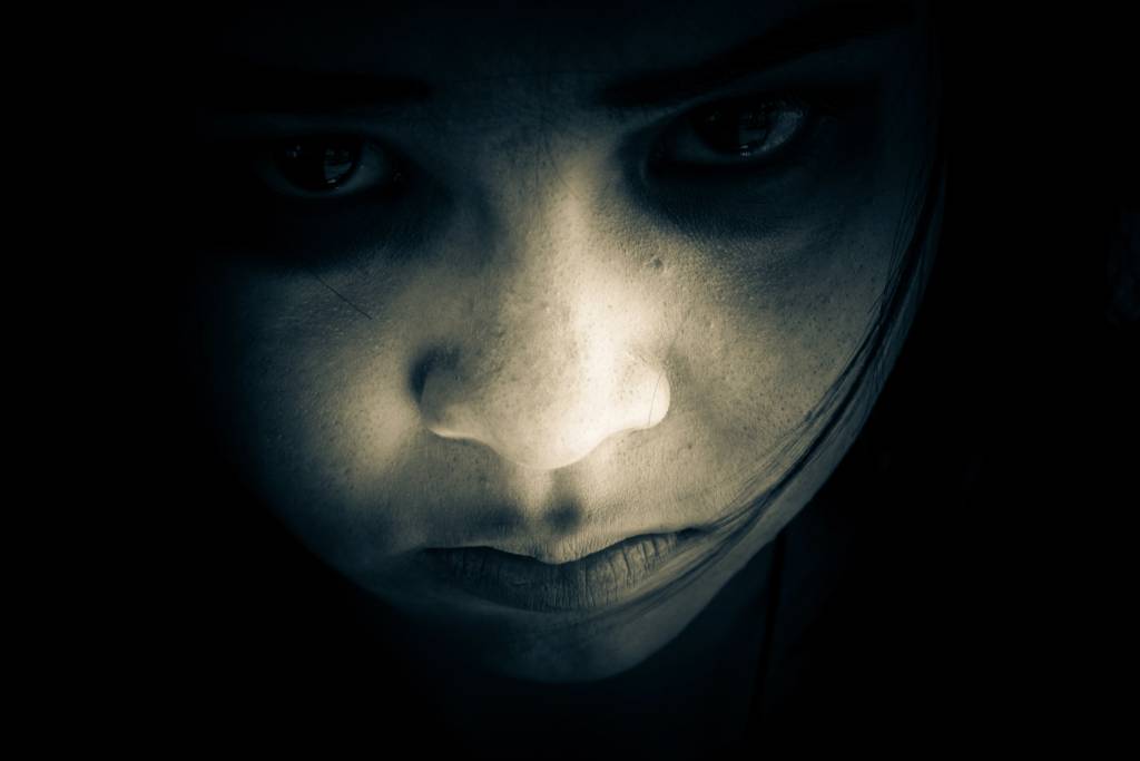 Portrait of scary girl staring at cameras. (Photo: Shutterstock)