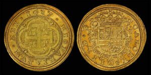 Eight gold Spanish escudo (1687), issued during the reign of Carlos II of Spain.