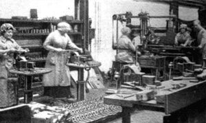 Female workers in Manchester, standing in for the depleted male workforce, 22 June 1916 ("American Machinist," vol. 44, issue 25, p. 1060) (Credit: Wikimedia)