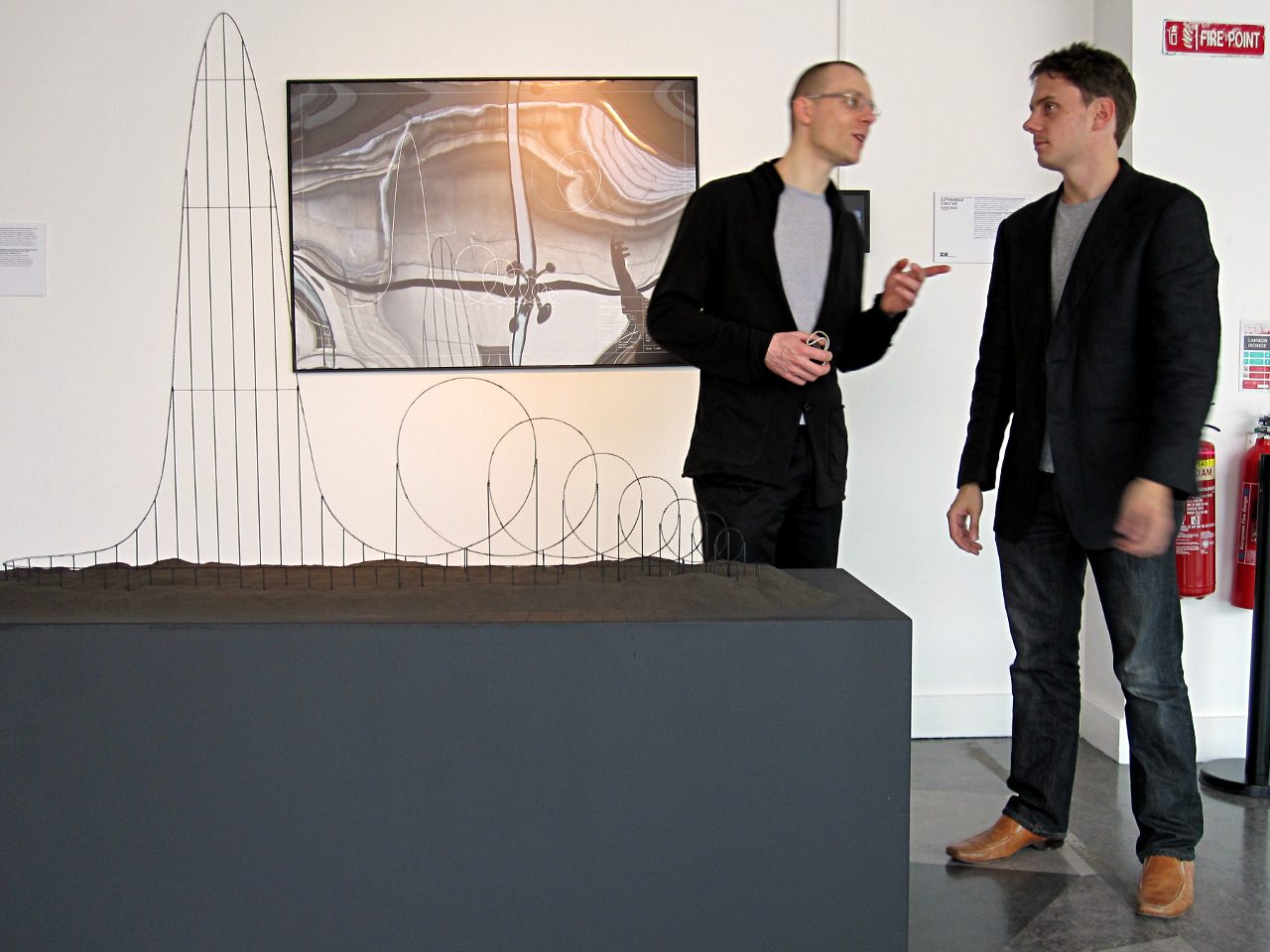 Julijonas Urbonas (left) and the Euthanasia Coaster concept at the HUMAN+ exhibition at the Science Gallery in Dublin.