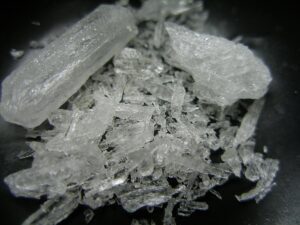 a beautiful macro shot of Crystal Methamphetamine in a black background