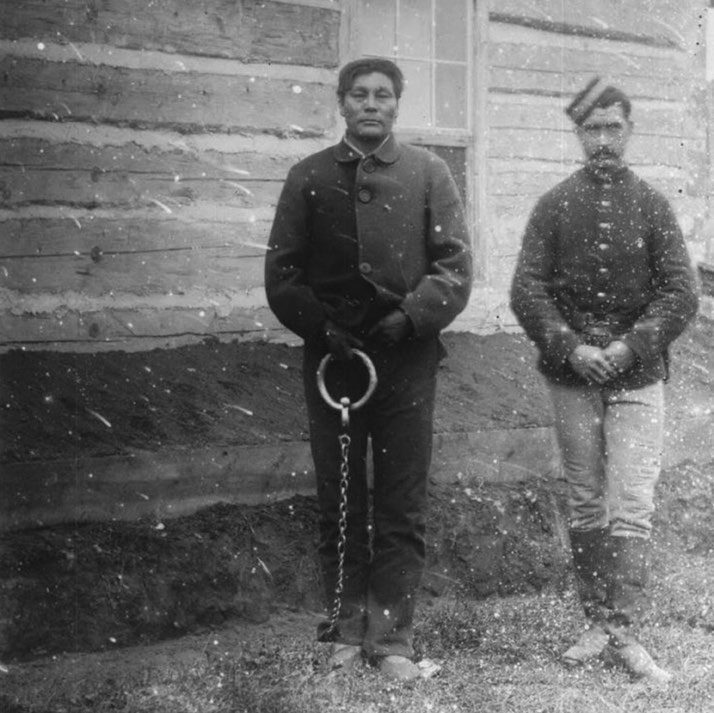 Kakisikuchin (Swift Runner) next to a NWMP officer