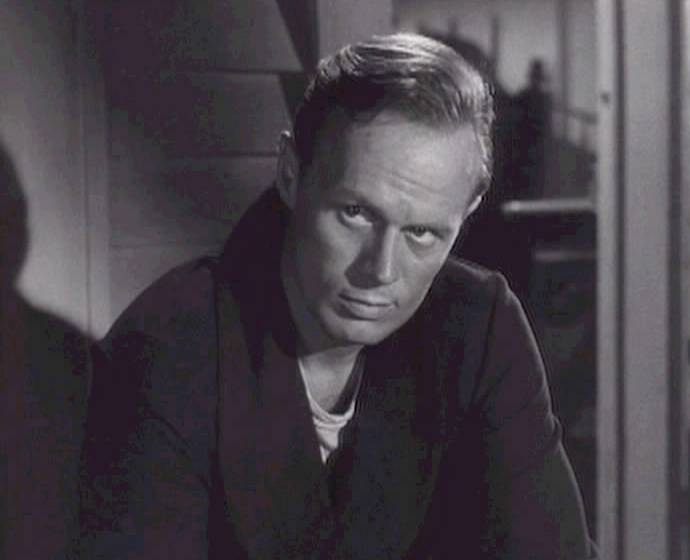 Richard Widmark in a still from <em>Panic in the Streets</em> (1950). Widmark exerted so much influence in Hollywood that he persuaded studio executives to replace Director David Totten with Don Siegel during the making of <em>Death of a Gunfighter</em> (1969).