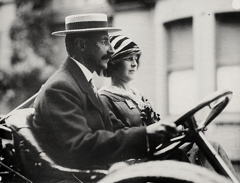 John Jacob Astor IV and Madeleine Astor, captured circa 1911/1912, cruising in a sleek motor car. 